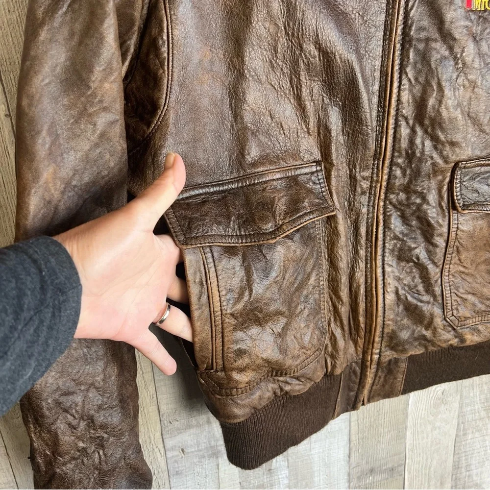 Vintage LeatherTown Bomber Aviator
Leather Jacket Size 40 Embroidered
Michelob - Picture 4 of 16